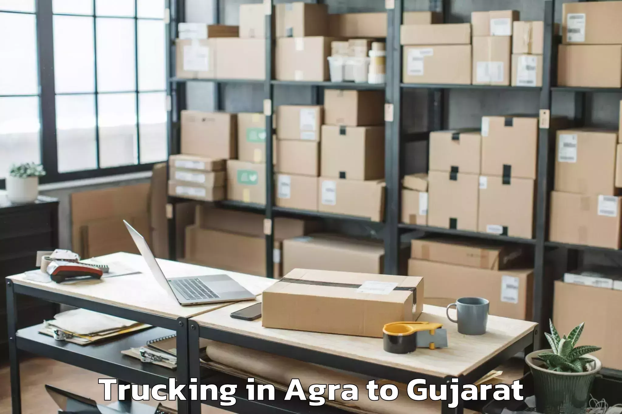 Book Agra to Songadh Trucking Online